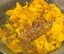Triangoli al formaggio con rag� di salsiccia - Alessandra Spisni