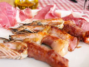 Involtini di gamberi al prosciutto crudo