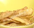 Bucce di patate fritte - cotto e mangiato