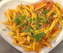 Garganelli mandorle speck e rucola