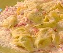 Tortelli di patate con salsa allo spalmabile e peperoni